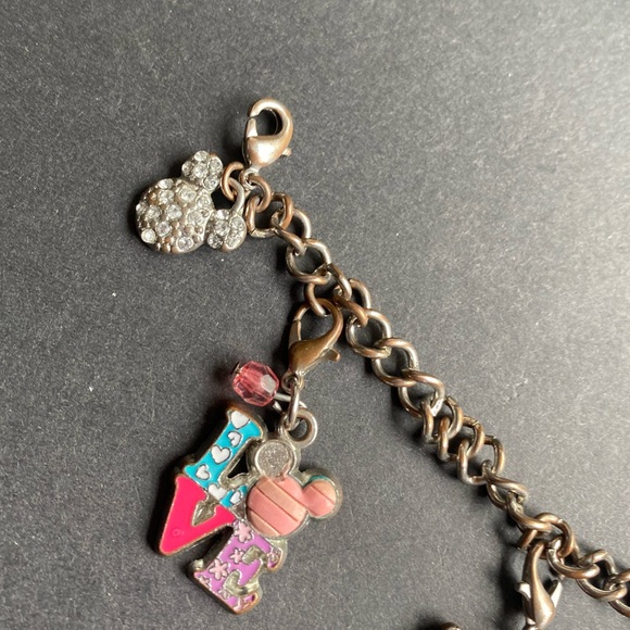 Disney charm bracelet with 7 charms plus the silver toned Mickey head - Picture 5 of 10